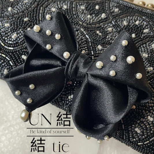 Limited Edition Handmade Black Satin Multi-Layered Bow Brooch with Pearl Accents